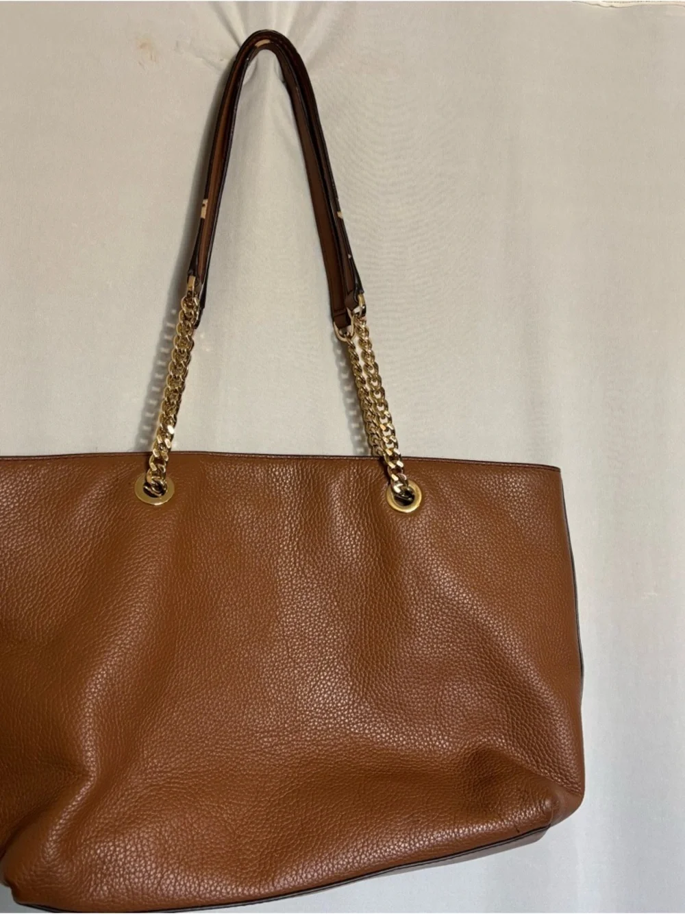 Michael Kors Cognac Pebbled Leather Tote with Gold Chain Straps zipper closure
